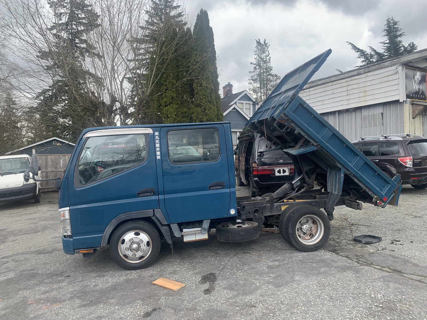 Toyota Hiace with pop top Mitsubishi Canter