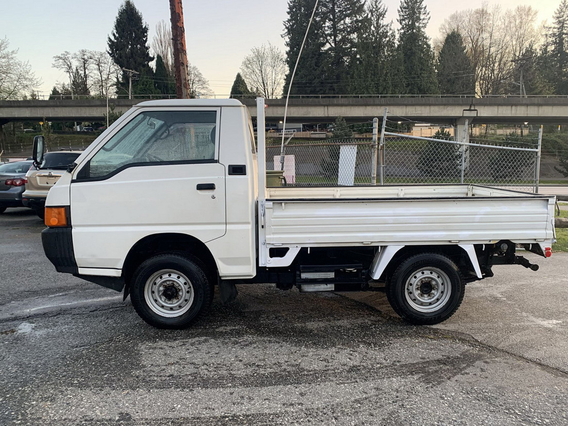 Toyota Hiace with pop top Mitsubishi Delica truck