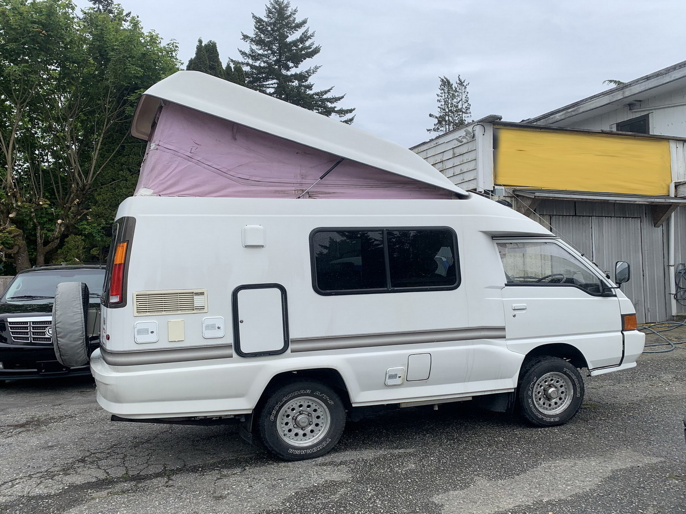 Toyota Hiace with pop top Delica camper
