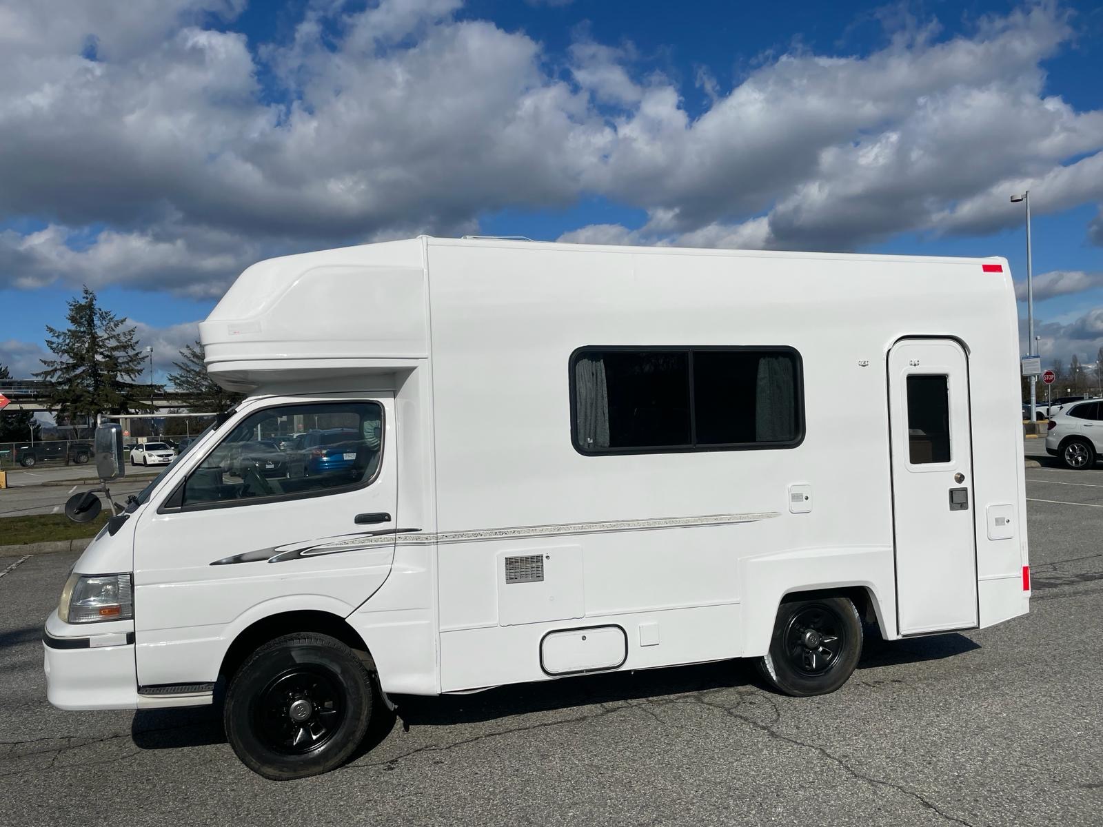 Toyota Hiace
                                                          with pop top Toyota
                                                          hiace camper
                                                          van